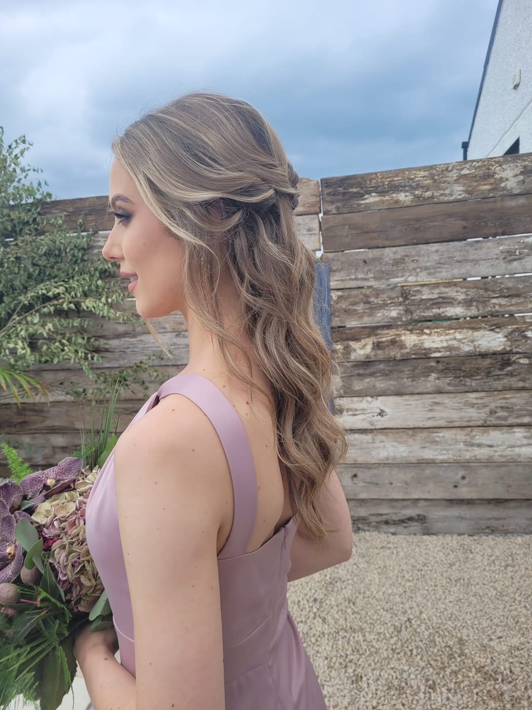 Half-up blonde style with soft waves, styled at INCH Hair Design in Gortnahoe